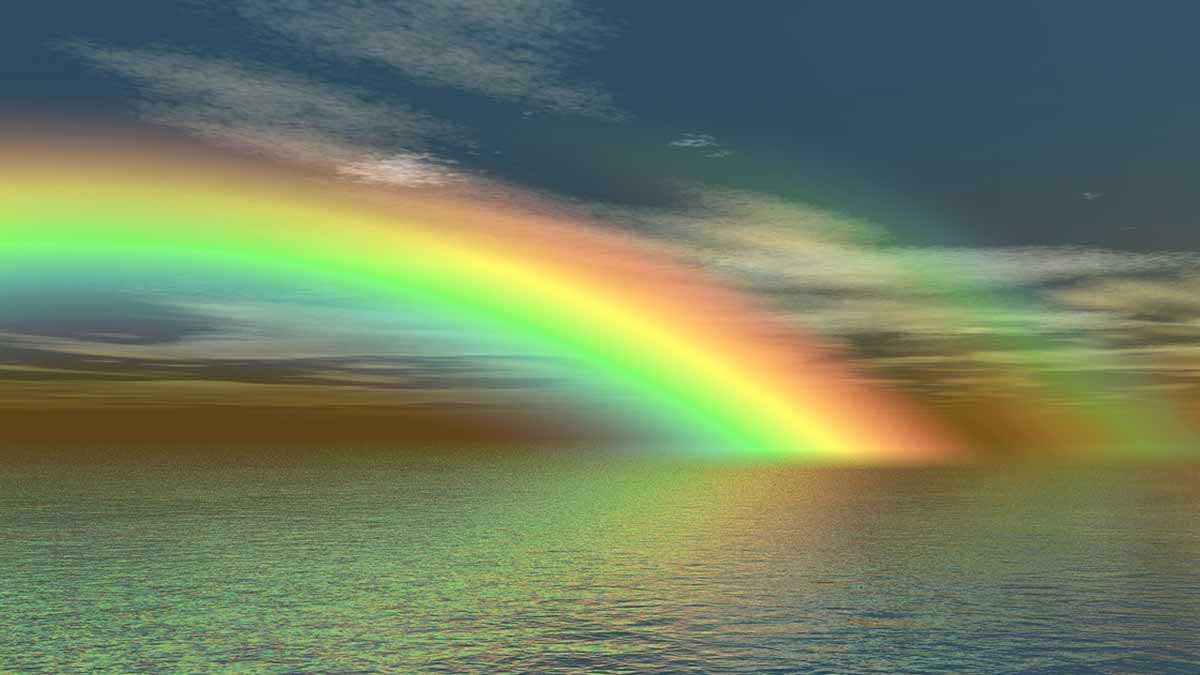 Chicago Reiki - brilliant rainbow over a body of water