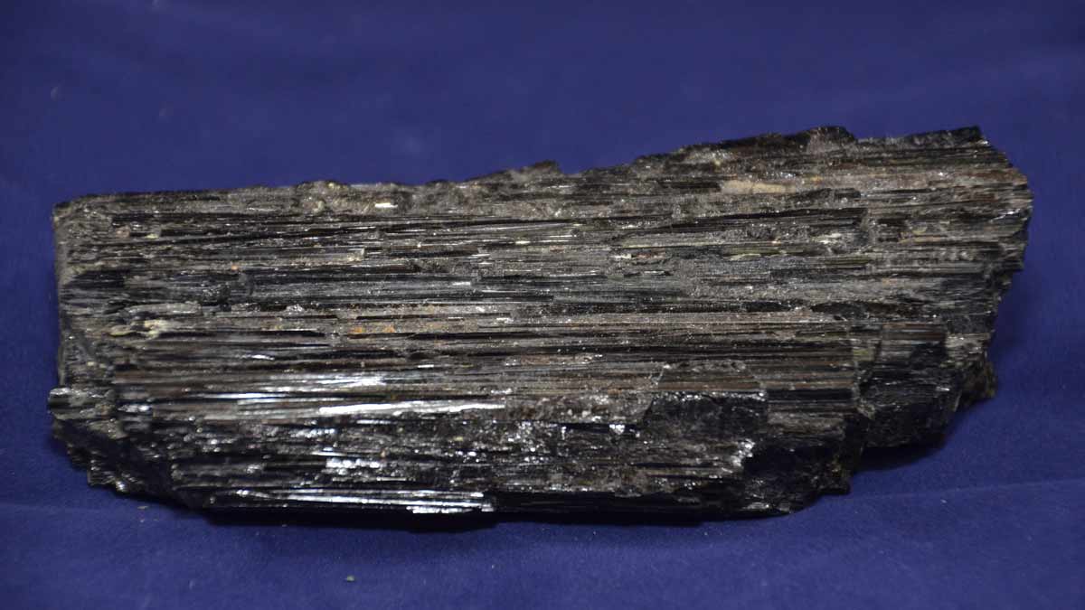 Chicago Reiki and Crystals - Image of raw black tourmaline stone