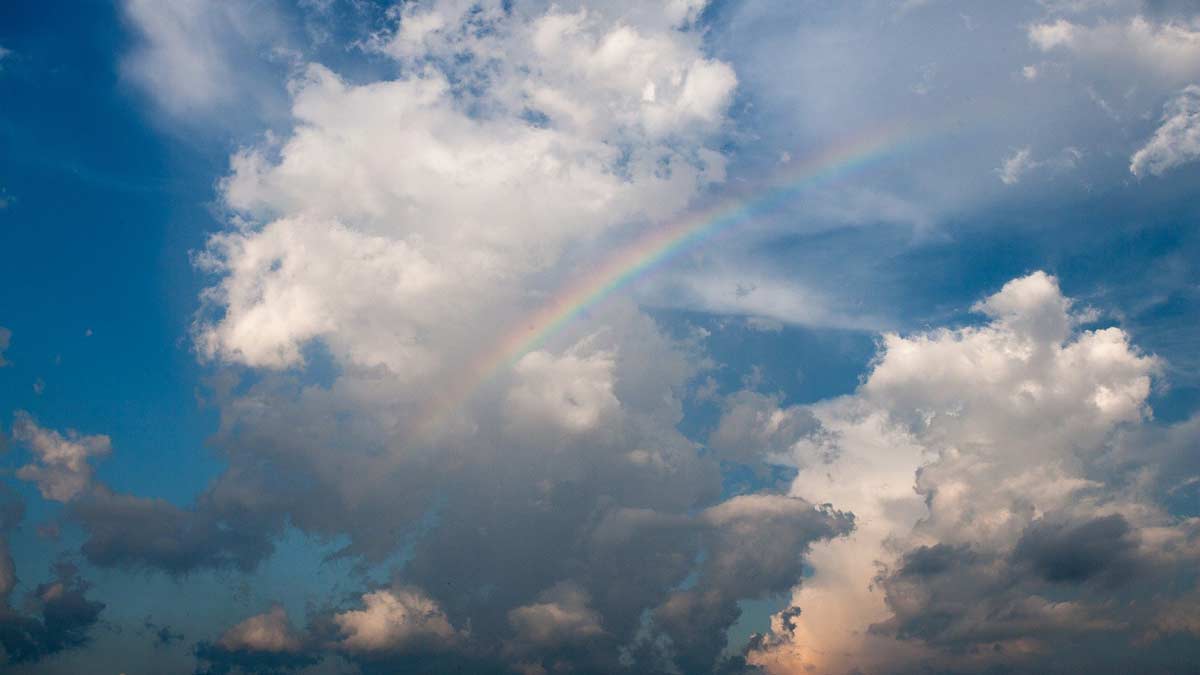 Jerry Mikutis - Chicago Reiki Online Circle -rainbow through clouds in blue sky